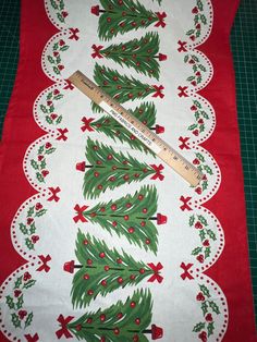 a christmas tree table runner with measuring tape