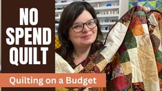 a woman holding up a quilt with the words no spend quilting on a budget