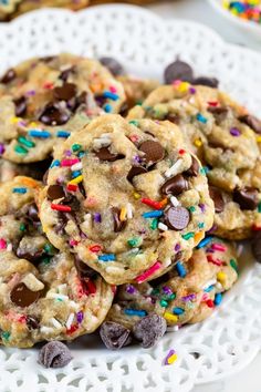 chocolate chip cookies with sprinkles on a white plate