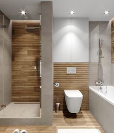 a modern bathroom with wood paneling and white fixtures