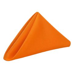 an orange napkin folded in the shape of a triangle