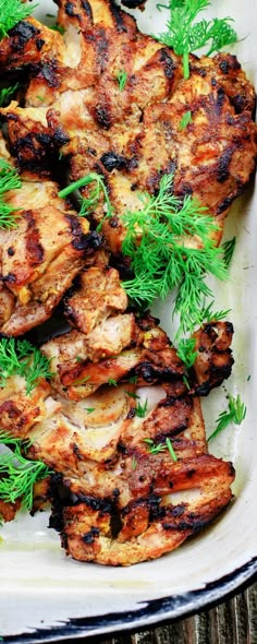 grilled chicken with herbs on a plate