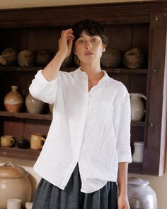 Our oversized linen shirt is chic, comfortable and easy wearing, a daily staple. (P&S owner Joanna has 3 of them!) Pair it with jeans or a maxi skirt, layer with our cable knit cardigan for a classic academic style. Crafted to last in a shirting weight, soft white 100% European linen. DETAILS Blouse Features:- A button up, collared neckline- Full length sleeves with a delicate single buttoning cuff- A scalloped hem- Chest pocket Fabric: 100% pre-shrunk Linen. Made from sustainably grown European Academic Style, Oversized Linen Shirt, Linen Shirts, Chunky Cable Knit, Skirt And Blouse, European Linens, Boyfriend Style, Cable Knit Cardigan, Linen Blouse