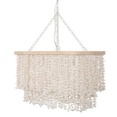 a white chandelier hanging from the ceiling