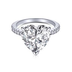 a heart shaped diamond ring on a white background