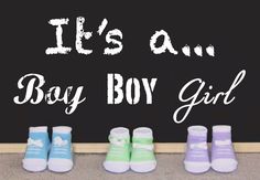 four baby shoes lined up in front of a chalkboard that says it's an boy boy girl