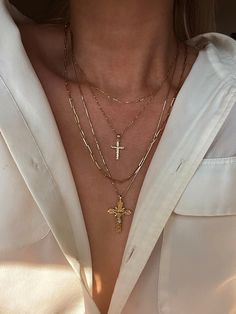 DESCRIPTIONTake us to church. A cross pendant lined with diamond cuts placed on our Singapore Chain makes the perfect everyday necklace. Layer with The Crucifix Necklace for effect. DETAILS- always made in 14k gold- pendant measurement: 22mm x 12mm- model wears a 18" Luxury Cross Necklace In Fine Jewelry Style, Luxury Cross Pendant Necklace With Large Pendant, Cheap Gold Cross Chain Necklace, Affordable Metal Cross Charm Necklace, Luxury Timeless Cross Pendant Jewelry, Luxury Metal Cross Necklace, Luxury Classic Yellow Gold Cross Necklace, Gold Crucifix Necklace, Layered Cross Necklace