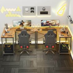 two computer desks sitting next to each other on top of a hard wood floor