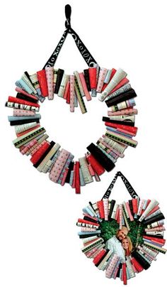 two wreaths made out of books are hanging on the wall, one is decorated with an image of a woman