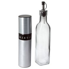 a glass bottle next to a stainless steel flask with the word misto on it