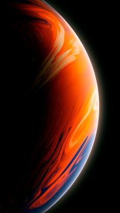 an orange and blue planet in the dark sky