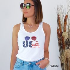 4th of July Shirt, Happy 4th 2023 Shirt, Freedom Shirt, Fourth Of July Shirt, Patriotic Shirt, Independence Day Shirts, Patriotic, Womens Tank, 4th of July Tank Top  A high-quality print of this slim fit tank-top will turn heads. Bystanders won't be disappointed - the racerback cut looks good on any woman's shoulders. .: Material: 60% combed ring-spun cotton, 40% polyester .: Extra light fabric (3.9 oz/yd² (132 g/m .: Slim fit .: Tear-away label .: Runs smaller than usual Labor Day Cotton Tops Made In Usa, Cotton Tops Made In Usa For Labor Day, Crew Neck Cotton Tank Top For 4th Of July, 4th Of July Cotton Tank Top With Letter Print, Sleeveless Graphic Print Top For 4th Of July, American Flag Print Cotton Tank Top For Independence Day, Casual Letter Print Tops For Veterans Day, White American Style Tops For Memorial Day, 4th Of July American Flag Print Cotton Tank Top