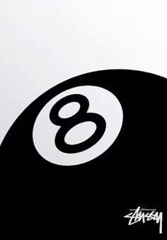 an eight - ball logo is shown on the back of a black and white wall