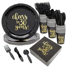 black and gold party supplies with cheers to 30 years written on the plates, napkins, forks, silverware