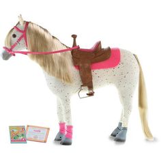 a toy horse with pink and brown accessories