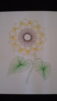 a drawing of a flower with green stems and yellow petals in the center, on a white background