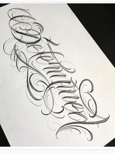 an artistically designed piece of paper with the word'beautiful'written in cursive writing