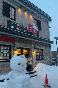 the hello kitty store is covered in snow