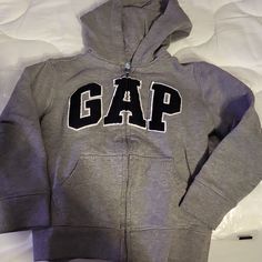 New Full Zip Hoodie Gray Size 5 Sweatshirt Check Out My Closet For Other Brands Puma, Disney, Gymboree, Oshkosh, Lego Carters, Old Navy, Baby Gap, Jumping Beans, Cat & Jack, Polo, Carhartt, Keen, Nautica, Nike, Under Armour, John Deer, Ralph Lauren, Columbia, Bogs, Lego, Pixar, New Balance Boy And Girl Make A Bundle For An Additional Discount! Cheap Basic Gap Bottoms, Gap Letter Print Tops For Winter, Gap Tops With Letter Print For Winter, Gap Winter Tops With Letter Print, Sporty Gap Tops For Winter, Gap Cotton Hooded Top, Gap Long Sleeve Top With Letter Print, Gap Fleece Long Sleeve Outerwear, Gap Long Sleeve Fleece Outerwear