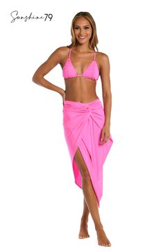 At once sexy and sophisticated, this pareo by Sunshine 79 is destined to become your go-to favorite of the season. Equally gorgeous paired with a one-piece suit as it is a bikini top and bottoms, this convertible sarong has a faux wrap design that creates gorgeous cascades of softly draping fabric. [split] Details Pareo cover-up Faux wrap design Lightweight fabric Fabric 83% Nylon, 17% Lycra Elastane Fitted Cover-up For Beach Season Parties, Fitted Beachy Cover-up For Party, Fitted Beachy Party Cover-up, Fitted Pink Beach Cover-up, Chic Tie-side Bottom Swimwear For Vacation, Chic Tie-side Swimwear For Vacation, Chic Vacation Swimwear With Tie-side Bottom, Chic Triangle Top Swimwear For Beach, Chic Pool Cover-up For Vacation