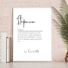 a white poster with the words sepromm on it next to some books and a potted plant