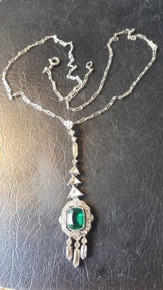 This pendant is not marked but has been tested and is sterling. It is 2 1/2 inches lond and 5/8 inch across and mis very Art Deco in style. The chain is malred sterling and is 18 inches long. Two of the triangle pastes have chips but other than that, the necklace is in good condition. C. 1925 and American. Follow me on instagram@jettesjewels. Art Deco Necklace Vintage, Jewelry Makers Marks, Art Deco Necklace, The Triangle, Jewelry Maker, Vintage Necklace, The Chain, The Necklace, Necklace Etsy