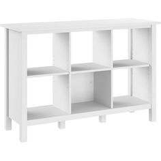 a white shelf with four shelves on each side