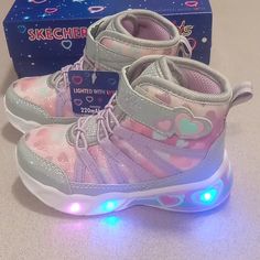 About Skechers Toddler Girls Sweetheart Lights -Dreamy Love Light-Up Sneaker Boots Pop Her Into These Skechers Sweetheart Lights- Dreamy Love Sneaker Boots And Watch Her Light The Way With A Shock-Absorbing Light-Up Midsole. Canvas And Synthetic Upper Padded Collar And Tongue Light-Up Midsole With Heart Detail Stretch Laces With Touch-Fasten Strap Cushioned Footbed Non-Marking Flexible Outsole Light Up Sketchers, Big Sneakers, Dreamy Love, Custom Sneakers Diy, Princess Book, Play Shoes, Light Up Sneakers, Slipon Sneakers, Light The Way