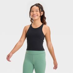 Why we're ALL IN: Fitted tank top with a pullover design, U-neckline and cropped cut. Crafted from recycled polyester with spandex and features quick-drying, moisture-wicking properties to keep them feeling cool and fresh during any activities. The built-in shelf bra and strappy crisscross back complete the look with added comfort and style. All in Motion™: Made for every move, priced for every day. Fitted Tank Top, All In Motion, Athletic Top, Hem Style, Pullover Designs, Black Xs, Country Outfits, Cosplay Outfits, Comfy Outfits