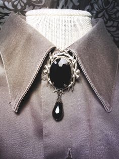 Zinc alloy antler frame with glass rhinestone setting and black teardrop bead with gunmetal black cap Made with love by Sacke & Sugar in Chattanooga, TN. Jewelry has small parts and is not intended for children. Follow us on Instagram for updates and sales: @sacke_and_sugar Gothic Witchy Aesthetic, Black Witchy Jewelry For Cosplay, Goth Crystal Jewelry, Luxury Black Gothic Jewelry, Vampire Culture, Ender Man, April Goth Necklace, Alt Accessories, Black Antlers