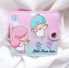 Add a touch of cuteness to your everyday style with Sanrio's Kawaii collection casual money bag! Featuring beloved characters like Hello Kitty, Cinnamoroll, My Melody, and Kuromi, this wallet is sure to delight fans of all ages. the wallet has dimensions of 11 cm by 9.5 cm. Crafted from high-quality polyester material, this money bag is durable and built to last. It's designed to securely hold your coins, cards, and cash, making it a practical accessory for everyday use. The easy-to-use buttons Cute Wallets With Card Slots For Daily Use, Cute Pink Wallets For Daily Use, Cinnamoroll Wallet, My Melody Card Holder, Kawaii Pink Wallet, My Melody Wallet, Kawaii Daily Use Coin Purse, Kawaii Rectangular Wallets With Card Slots, Hello Kitty Vintage Wallet