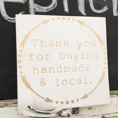 a sign that says thank you for buying handmade and local