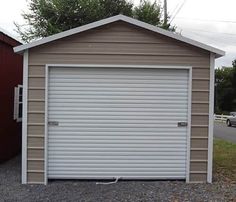 two garages side by side, one with a door open and the other closed