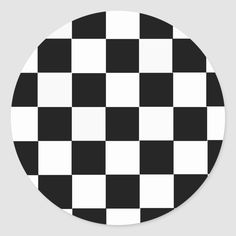 a black and white checkered pattern on a round sticker