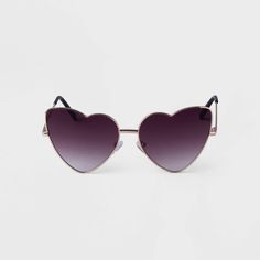 Keep your look both cute and stylish no matter what your day holds with these Metal Heart Sunglasses from A New Day™. The sunglasses sport a heart shape that flatters a variety of face shapes, and the frame comes in a gold finish for a fashionable look that's easy to style. The UV-resistant properties help to safeguard your eyes from harmful UV rays, complete with nosepads for comfortable wear. Whether you’re exploring the city or having a picnic with friends, these sunglasses are the perfect su Trendy Heart-shaped Sunglasses With Heart Print, Trendy Heart Print Sunglasses For Valentine's Day, Heart-shaped Sunglasses With Heart Print, Trendy Valentine's Day Sunglasses With Heart Print, Fun Heart-shaped Sunglasses With Heart Print, Casual Heart-shaped Sunglasses With Heart Print, Casual Tinted Sunglasses For Valentine's Day, Valentine's Day Casual Sunglasses With Tinted Lenses, Picnic With Friends