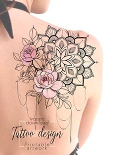 the back of a woman's body with tattoos on it and flowers in the center