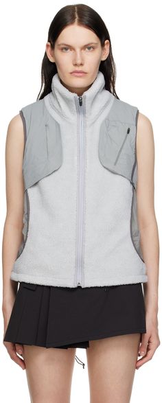 Sherpa fleece vest. · Paneled construction · Polyester-blend taffeta overlay · Stand collar · Zip closure · Canvas panel and concealed pocket at side seams · Concealed bungee-style drawstring at hem · Zip pocket at back · Partial nylon ripstop underlay · Full stretch knit lining Supplier color: Slate Hyein Seo, Instagram Lifestyle, Running Vest, Grey Panels, Outerwear Vest, Vest Outfits, Fleece Vest, Sherpa Fleece, Apparel Design