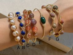 Stone: Freshwater pearl, Lapis Lazuli, Red Agate, Malachite, Alashan Agate, Amethyst with gold filled wire detail SIZE:  one size, fits 15-16cm wrist  Closure: - fixed open end, the band is stretchable  17cm at max suggested. if you're not sure about the sizing, feel free to send me a DM I'm happy to help Wire Wrapped Jewelry Bracelets, Bohemian Bangle With Natural Stones As Gift, Gold Wire Wrapped Beaded Bracelets For Healing, Wired Bracelet, Bohemian Wire Wrapped Beaded Bracelets As Gift, Bohemian Bangle As A Gift With Unique Variations, Bohemian Gemstone Bangle As Gift, Handmade Bohemian Bangle As Gift, Wire Wrapped Beaded Bangle Bracelet For Gifts