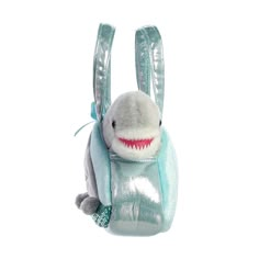 a stuffed animal with a shark on it's back