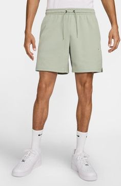 Whether hanging out of hitting the gym, comfort is key in these versatile shorts made with handy pockets for essentials and the brand's Dri-FIT moisture-wicking technology. 7" inseam; 24" leg opening; 10" front rise; 12 1/2" back rise (size Medium) Elastic/drawstring waist Hidden side-zip pockets; back drop-in pocket Dri-FIT moisture-wicking technology 78% polyester, 22% cotton Machine wash, dry flat Imported Sportswear Shorts With Comfort Waistband, Comfort Waistband Sportswear Shorts, Nike Sporty Bottoms With Short Inseam, Sporty Shorts With Comfort Waistband And Short Inseam, Gym Shorts With Relaxed Fit And Short Inseam, Gym Shorts Relaxed Fit, Relaxed Fit Gym Shorts With Short Inseam, Relaxed Fit Training Bottoms Short Length, Functional Shorts With Elastic Waistband And Relaxed Fit