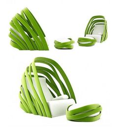 three green and white chairs sitting next to each other