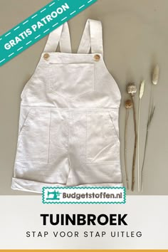 a white apron and some flowers on a table