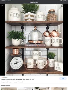 the shelves in this kitchen are filled with coffee mugs, pots and other items