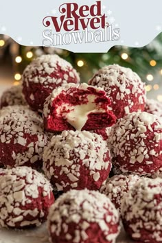 red velvet snowballs are stacked on top of each other with white chocolate sprinkles