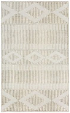 a beige and white rug with diamond shapes