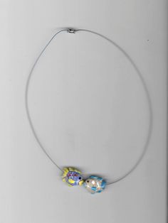 Nylon coated stainless steel necklace with two ceramic fish beads made by hand in Barcelona Fish Beads, Ceramic Fish, Stainless Steel Necklace, How To Make Beads, Stainless Steel, Ceramics, Beads