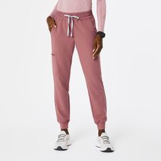 Official FIGS® Scrubs. Ridiculously Soft Scrubs Designed Just For You. Get Free Shipping On Orders $50+! | FIGS Womens Mauve Uman Relaxed - Tall Jogger Scrub Pants Fitted Joggers With Pockets For Work, Fitted Workwear Joggers With Pockets, Fitted Ankle-length Joggers With Pockets, Pink Relaxed Fit Cotton Joggers, Figs Cargo Scrub Pants, Pink Leisure Joggers With Pockets, Jogger Scrubs, Scrub Joggers Figs, Fitted Ankle-length Cargo Pants With Elastic Waistband