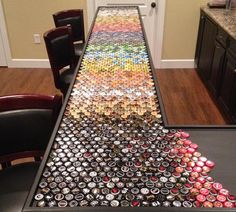 a very long table made out of cans and sodas on top of each other