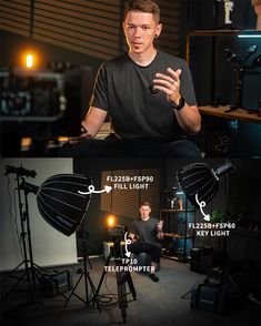 a man sitting in front of a camera with his hands up and the words below him