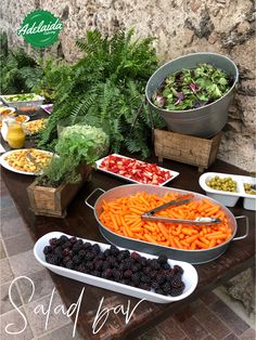 an assortment of fruits and vegetables on a table